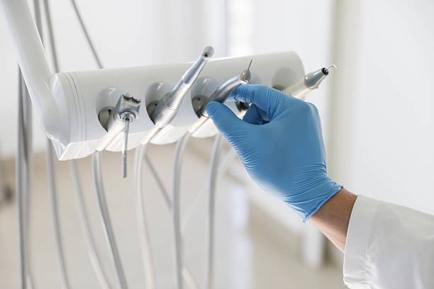 Professional Tooth Extraction technician working in Croswell, MI